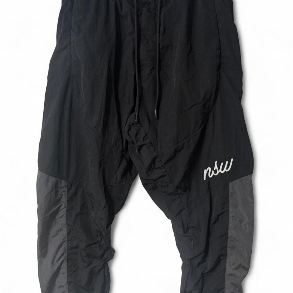 Nike black track pants with white logo
